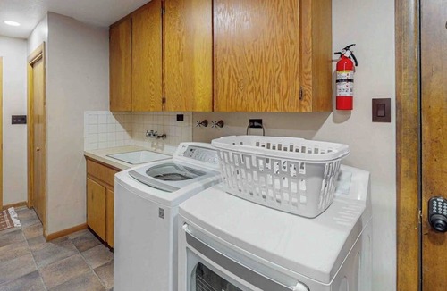 South Fork House | Spacious cabin with river views, private hot tub, sun room, and full kitchen!