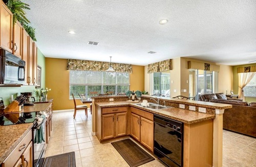 Watersong Cottage | Stunning Cottage with Games and Swimming Pool in Davenport, Florida