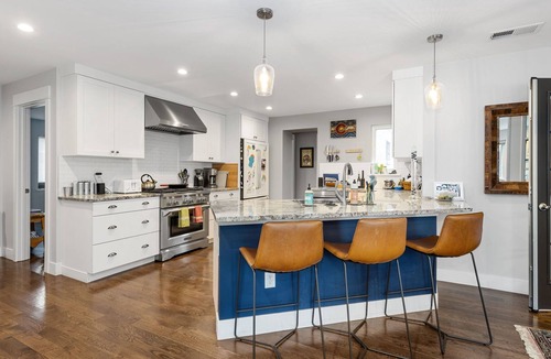 South Park Hill House | This house is a 4 bedroom(s), 2 bathrooms, located in Denver, CO.