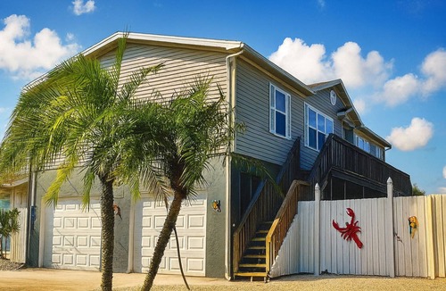 Pleasure Isles House | Waterfront Gulf Access Home - Private Dock + 6 Kayaks + Sunset Views - Sleeps 6
