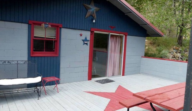 American-Themed Vacation Cabin with a Spacious Deck in Poudre Canyon near Fort Collins, Colorado