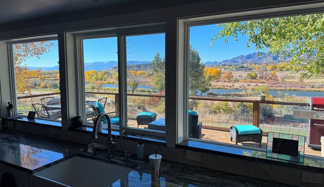 Beautiful River property with beach access. Relaxing deck-overlooking the valley