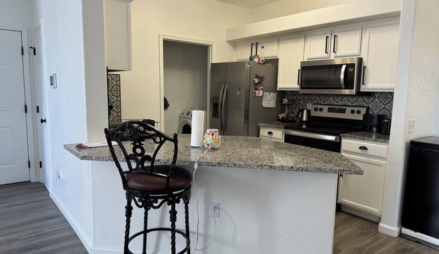 Cozy 1-bedroom shared space condo with WiFi, pool, and AC in enchanting Aurora