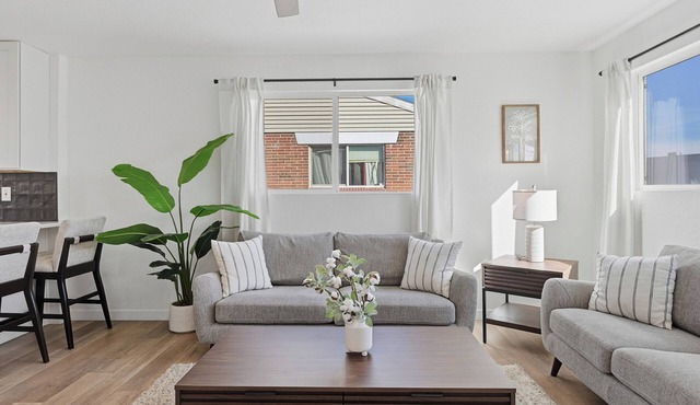 Cozy 2BR Retreat with Backyard Lounge