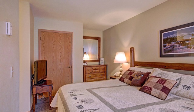 Cozy Hotel Room with Queen-Sized Bed