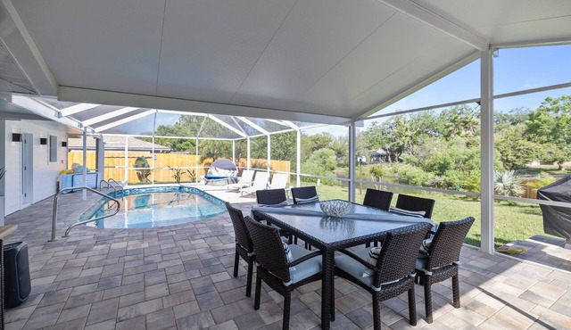 Family-Friendly Retreat w/Heated Pool, Fishing Pond, Bikes, BBQ, Gourmet Kitchen & Kid Essentials in Port Richey