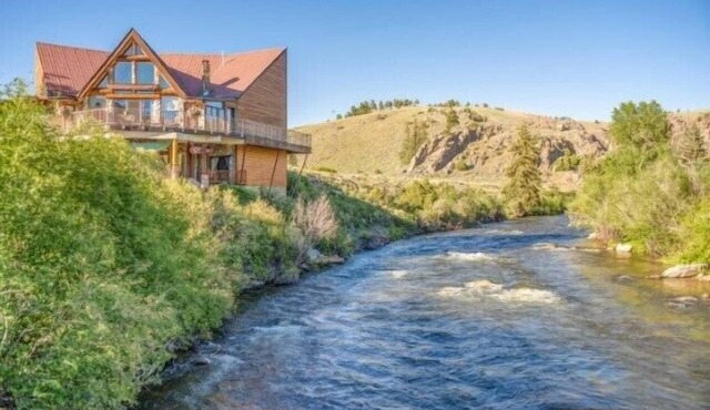 Great location on the Taylor River with fishing access!