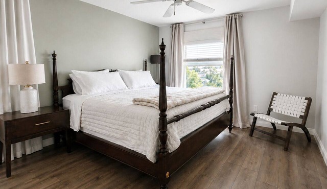 LOCATION! Monthly Stay – Gated 1BR King Condo w/Workspace, Balcony & Wi-Fi