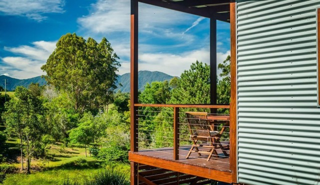Luxury cabins on 7.5 acres of beautiful gardens, forest and waterways. in Bellingen