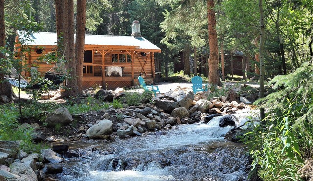 Modern Rustin Cabin with stream running through it!