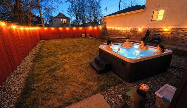 NEW! RiNo Villa: Event-Friendly, Sleeps 20! Hot Tub, Backyard & Games