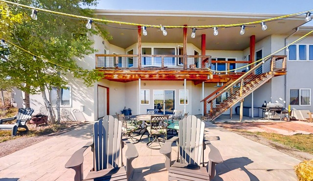 Newly built walkout basement with water views, patio, & Ping-Pong table in Fort Collins