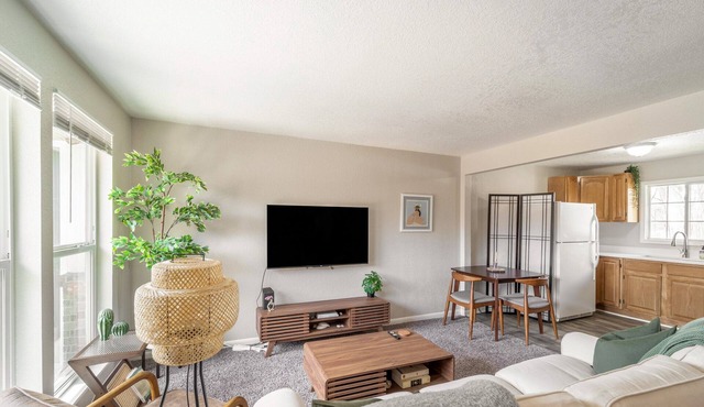 NO exta fees, Beautiful half duplex 3br, 2ba, w/gym, office and fenced in yard.