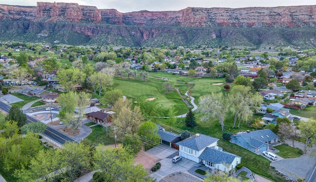Private Home right on Golf Course with Million Dollar National Monument Views