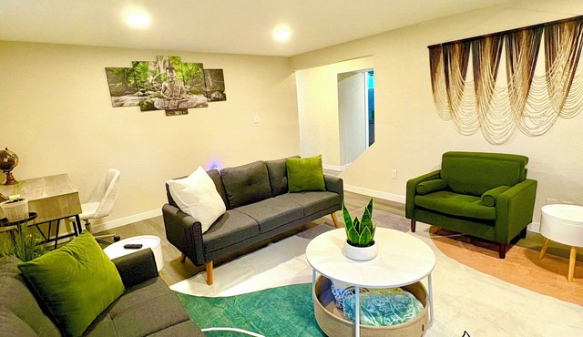 Renovated Private Residence Below basement, Garage, EV charger, Fenced patio.