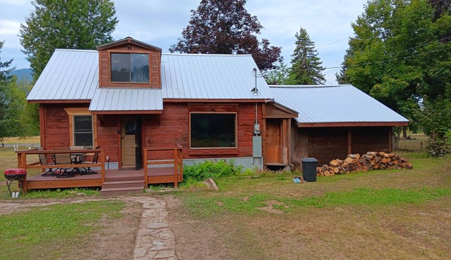 Rustic cabin built 1880s on the Clark Fork River in Clark Fork