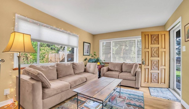 Solar-Powered Eco Bungalow, Walk to Lake + Park, EV Charger, Fenced Garden Oasis