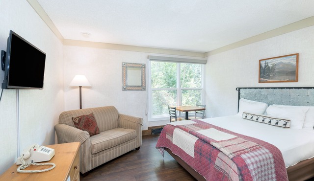 Updated Hotel Room With Kitchenette, Seating Area at the Mountainside Inn