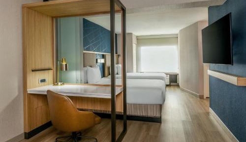Queen Suite with Two Queen Beds and Sofa Bed