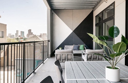 River North Art District Condo | Bright & Breezy | RiNo Loft with Custom Street Art | Dog-Friendly