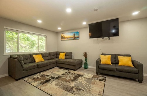 Allendale Area Apartment | Close to Downtown| Sleeps 8 | Private Backyard