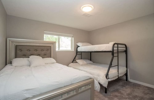 Allendale Area Apartment | Close to Downtown| Sleeps 8 | Private Backyard