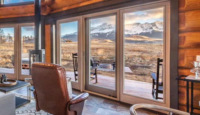 Custom log home in Telluride with epic mountain views in Placerville