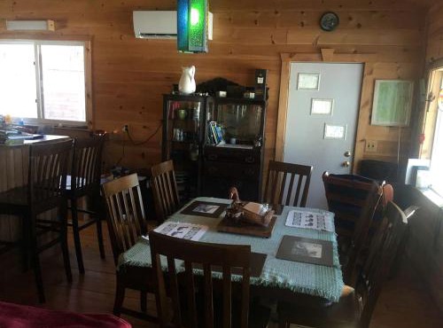 Charming Lakefront Cabin Rental with a Fire Pit near Brownville, Maine in Brownville